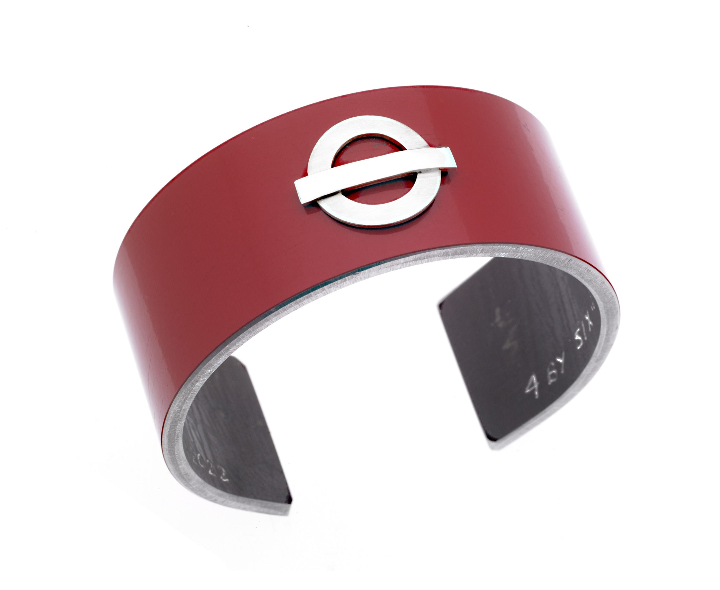 London doubledecker bus panel, turned into a bracelet with a tube symbol on it