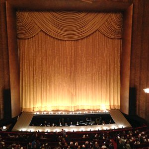 Golden Silk curtain at the Metropolitan Opera